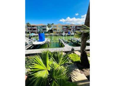 Income-Producing Waterfront Luxury! This channel-front townhome on South Padre Island Golf Club in Texas - for sale on GolfHomes.com, golf home, golf lot