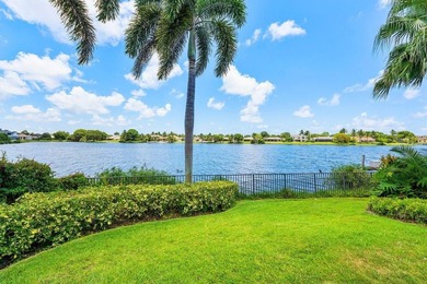 This exceptional lakeside estate blends sophistication, comfort on Bocaire Country Club in Florida - for sale on GolfHomes.com, golf home, golf lot
