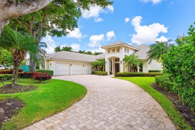 This exceptional lakeside estate blends sophistication, comfort on Bocaire Country Club in Florida - for sale on GolfHomes.com, golf home, golf lot