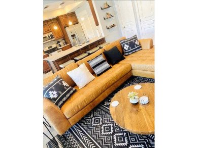 Income-Producing Waterfront Luxury! This channel-front townhome on South Padre Island Golf Club in Texas - for sale on GolfHomes.com, golf home, golf lot
