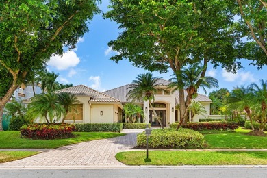This exceptional lakeside estate blends sophistication, comfort on Bocaire Country Club in Florida - for sale on GolfHomes.com, golf home, golf lot