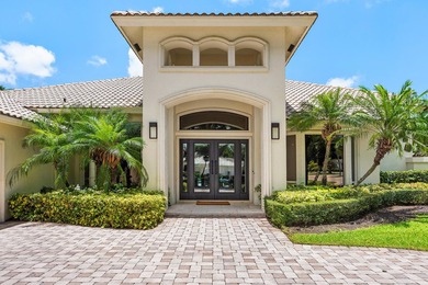 This exceptional lakeside estate blends sophistication, comfort on Bocaire Country Club in Florida - for sale on GolfHomes.com, golf home, golf lot