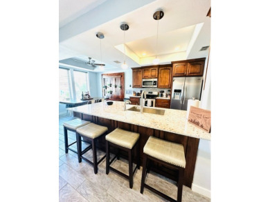 Income-Producing Waterfront Luxury! This channel-front townhome on South Padre Island Golf Club in Texas - for sale on GolfHomes.com, golf home, golf lot
