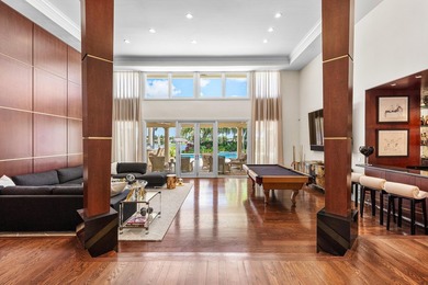 This exceptional lakeside estate blends sophistication, comfort on Bocaire Country Club in Florida - for sale on GolfHomes.com, golf home, golf lot