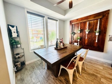 Income-Producing Waterfront Luxury! This channel-front townhome on South Padre Island Golf Club in Texas - for sale on GolfHomes.com, golf home, golf lot