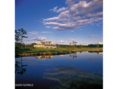 Beautiful Leopard's Chase golf course and pond homesite on Ocean Ridge Plantation in North Carolina - for sale on GolfHomes.com, golf home, golf lot