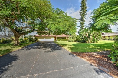 Discover the epitome of Southwest Florida living in this on Cypress Lake Country Club in Florida - for sale on GolfHomes.com, golf home, golf lot