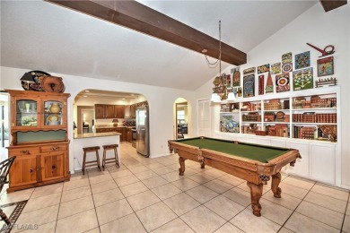 Discover the epitome of Southwest Florida living in this on Cypress Lake Country Club in Florida - for sale on GolfHomes.com, golf home, golf lot