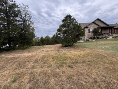 Discover the opportunity to craft your dream residence on on Ledgestone Country Club and Golf Course in Missouri - for sale on GolfHomes.com, golf home, golf lot