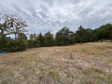 Discover the opportunity to craft your dream residence on on Ledgestone Country Club and Golf Course in Missouri - for sale on GolfHomes.com, golf home, golf lot