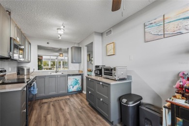 This beautifully updated first-floor condo in The Woods at on Pinebrook/Ironwood Golf Course in Florida - for sale on GolfHomes.com, golf home, golf lot