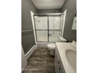Move right in to this updated 2-bedroom, 1-bath end unit in on Greenbriar Woodlands in New Jersey - for sale on GolfHomes.com, golf home, golf lot