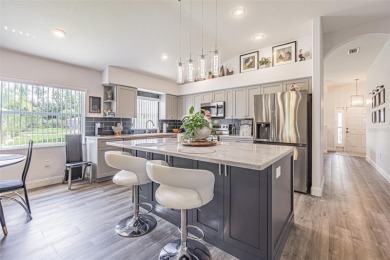 STUNNING REMODELED HOME, with over $40,000 in recent upgrades on Tampa Bay Golf and Country Club in Florida - for sale on GolfHomes.com, golf home, golf lot