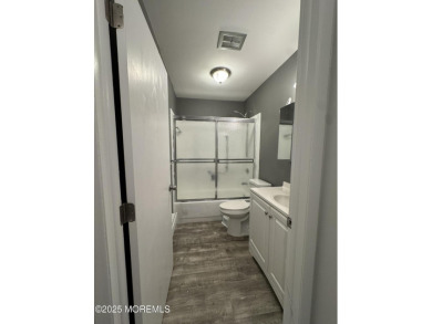 Move right in to this updated 2-bedroom, 1-bath end unit in on Greenbriar Woodlands in New Jersey - for sale on GolfHomes.com, golf home, golf lot