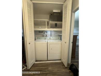 Move right in to this updated 2-bedroom, 1-bath end unit in on Greenbriar Woodlands in New Jersey - for sale on GolfHomes.com, golf home, golf lot