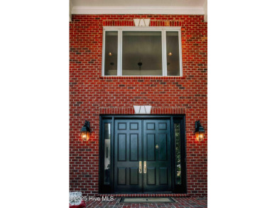 This exquisite brick home is tucked away on a cul-de-sac within on Pinewild Country Club of Pinehurst in North Carolina - for sale on GolfHomes.com, golf home, golf lot