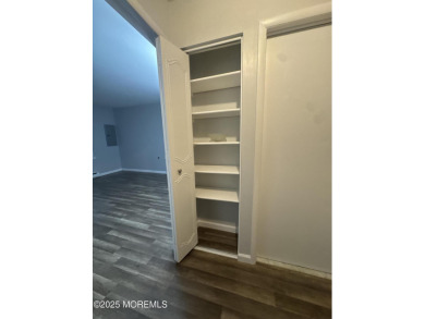 Move right in to this updated 2-bedroom, 1-bath end unit in on Greenbriar Woodlands in New Jersey - for sale on GolfHomes.com, golf home, golf lot