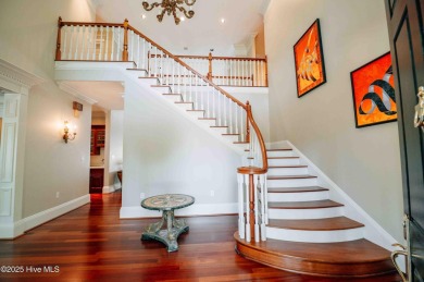 This exquisite brick home is tucked away on a cul-de-sac within on Pinewild Country Club of Pinehurst in North Carolina - for sale on GolfHomes.com, golf home, golf lot