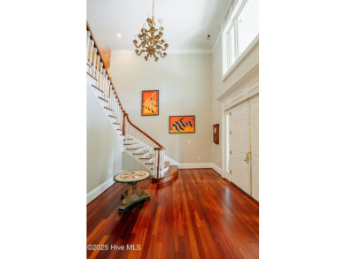 This exquisite brick home is tucked away on a cul-de-sac within on Pinewild Country Club of Pinehurst in North Carolina - for sale on GolfHomes.com, golf home, golf lot