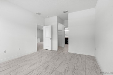 PRICE REDUCTION! Brand New 4 bedroom W/ ENSUITE! 3 bath Home in on Citrus Springs Country Club in Florida - for sale on GolfHomes.com, golf home, golf lot