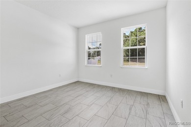 PRICE REDUCTION! Brand New 4 bedroom W/ ENSUITE! 3 bath Home in on Citrus Springs Country Club in Florida - for sale on GolfHomes.com, golf home, golf lot