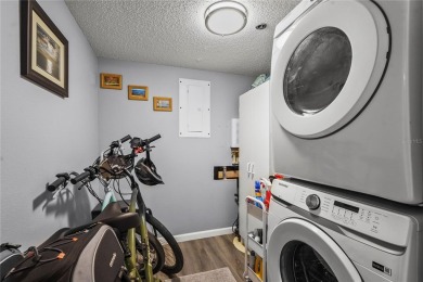This beautifully updated first-floor condo in The Woods at on Pinebrook/Ironwood Golf Course in Florida - for sale on GolfHomes.com, golf home, golf lot