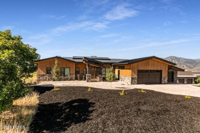 This fully furnished 6-bedroom, 6.5 bathroom contemporary home on Talisker Club At Tuhaye in Utah - for sale on GolfHomes.com, golf home, golf lot