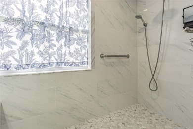 STUNNING REMODELED HOME, with over $40,000 in recent upgrades on Tampa Bay Golf and Country Club in Florida - for sale on GolfHomes.com, golf home, golf lot
