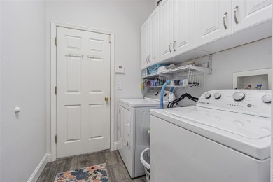 STUNNING REMODELED HOME, with over $40,000 in recent upgrades on Tampa Bay Golf and Country Club in Florida - for sale on GolfHomes.com, golf home, golf lot