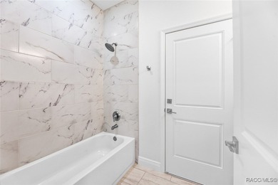 NO BACK NEIGHBORS! Brand New 4 bedroom W/ ENSUITE! 3 bath Home on Citrus Springs Country Club in Florida - for sale on GolfHomes.com, golf home, golf lot