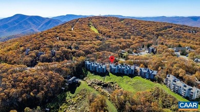 This top-floor, end-unit condo offers stunning year-round on Devils Knob in Virginia - for sale on GolfHomes.com, golf home, golf lot