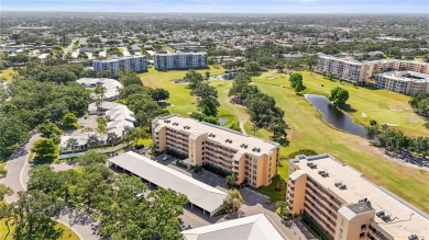 This beautifully updated first-floor condo in The Woods at on Pinebrook/Ironwood Golf Course in Florida - for sale on GolfHomes.com, golf home, golf lot