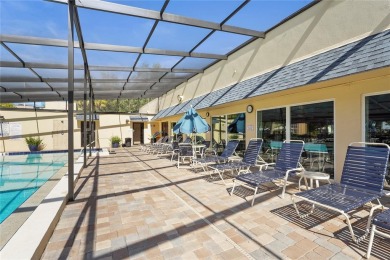 This beautifully updated first-floor condo in The Woods at on Pinebrook/Ironwood Golf Course in Florida - for sale on GolfHomes.com, golf home, golf lot