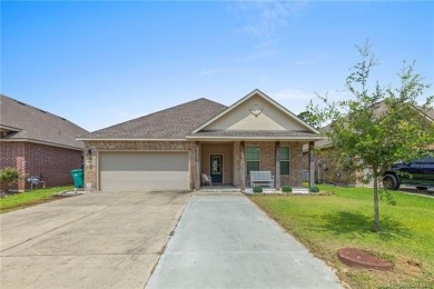 Modern 4-bedroom, 2-bathroom house positioned along the greens on The National Golf Club of Louisiana in Louisiana - for sale on GolfHomes.com, golf home, golf lot