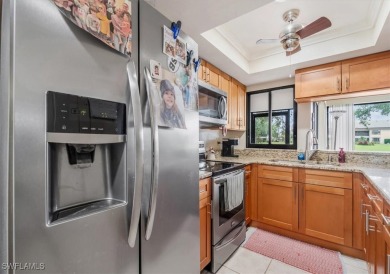 Discover this stunning 2-bedroom, 2-bath 1st-floor corner end on Hideaway Country Club in Florida - for sale on GolfHomes.com, golf home, golf lot