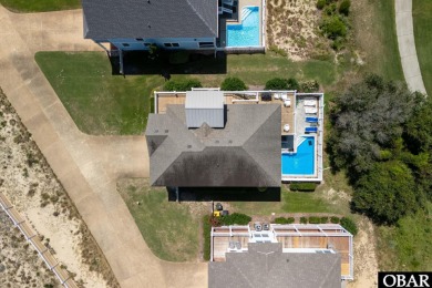 *Seas the day* is a beautifully maintained reverse-floor plan on The Currituck Golf Club in North Carolina - for sale on GolfHomes.com, golf home, golf lot