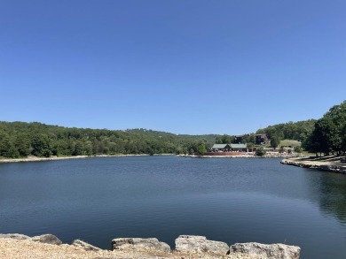 This pristine lodge located at the Cabins on Roark Creek in on Ledgestone Country Club and Golf Course in Missouri - for sale on GolfHomes.com, golf home, golf lot