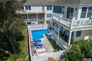 *Seas the day* is a beautifully maintained reverse-floor plan on The Currituck Golf Club in North Carolina - for sale on GolfHomes.com, golf home, golf lot