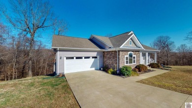 This well-maintained 3-bedroom, 2.5-bath home is situated on 2 on Mineral Mound Golf Course in Kentucky - for sale on GolfHomes.com, golf home, golf lot