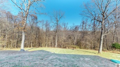 This well-maintained 3-bedroom, 2.5-bath home is situated on 2 on Mineral Mound Golf Course in Kentucky - for sale on GolfHomes.com, golf home, golf lot