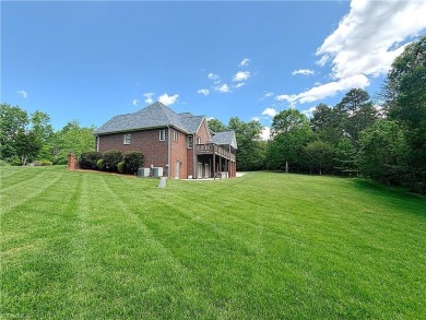 Step inside this beautiful custom estate located in Willow Creek on High Point Country Club  in North Carolina - for sale on GolfHomes.com, golf home, golf lot