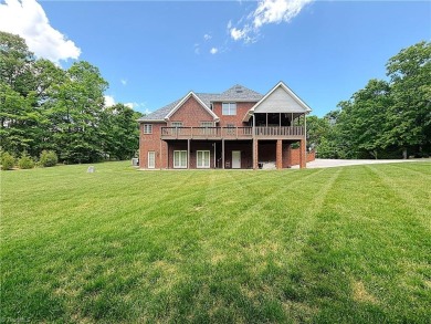 Step inside this beautiful custom estate located in Willow Creek on High Point Country Club  in North Carolina - for sale on GolfHomes.com, golf home, golf lot