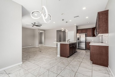 Welcome Home! This beautifully maintained villa is nestled in on Robson Ranch Golf Club in Arizona - for sale on GolfHomes.com, golf home, golf lot