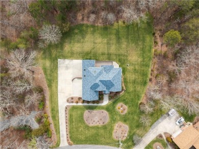Step inside this beautiful custom estate located in Willow Creek on High Point Country Club  in North Carolina - for sale on GolfHomes.com, golf home, golf lot