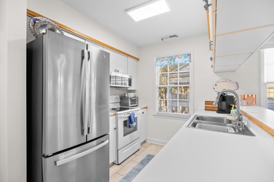 Beautifully decorated and furnished with upscale furnishings and on Pawleys Plantation Golf and Country Club in South Carolina - for sale on GolfHomes.com, golf home, golf lot