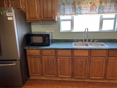 Beautiful Beach/Lake- Large 3-bedroom, 2-bath home situated on a on Prestwick Country Club in South Carolina - for sale on GolfHomes.com, golf home, golf lot