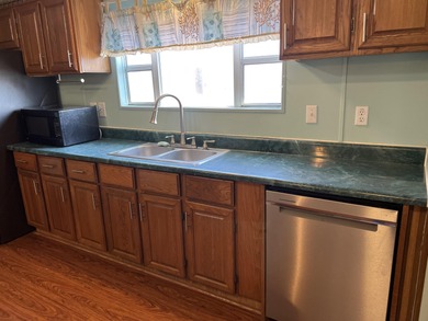 Beautiful Beach/Lake- Large 3-bedroom, 2-bath home situated on a on Prestwick Country Club in South Carolina - for sale on GolfHomes.com, golf home, golf lot