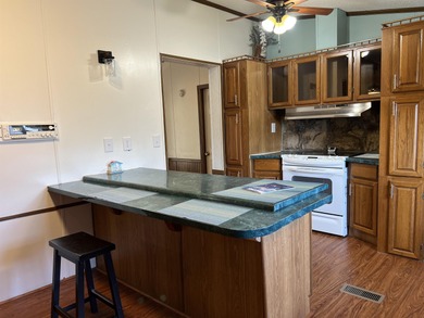 Beautiful Beach/Lake- Large 3-bedroom, 2-bath home situated on a on Prestwick Country Club in South Carolina - for sale on GolfHomes.com, golf home, golf lot