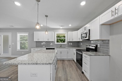 Discover this stunning 3-bedroom, 2.5-bath home with a spacious on Turtle Cove Golf Course in Georgia - for sale on GolfHomes.com, golf home, golf lot