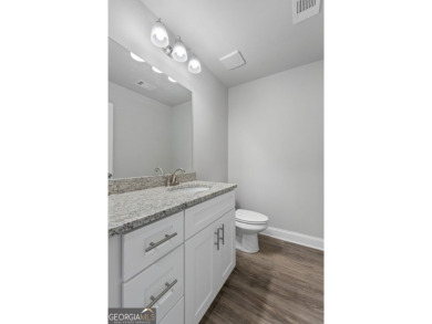 Discover this stunning 3-bedroom, 2.5-bath home with a spacious on Turtle Cove Golf Course in Georgia - for sale on GolfHomes.com, golf home, golf lot
